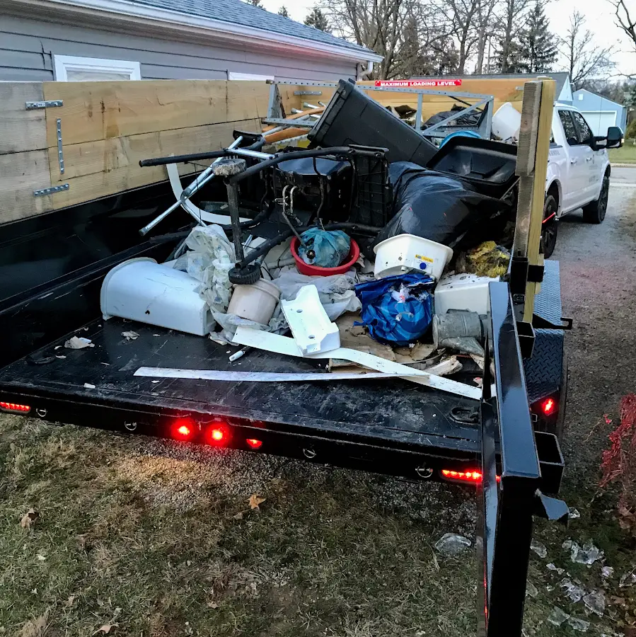 Roll-off dumpster delivered to a residential driveway in Belgrade